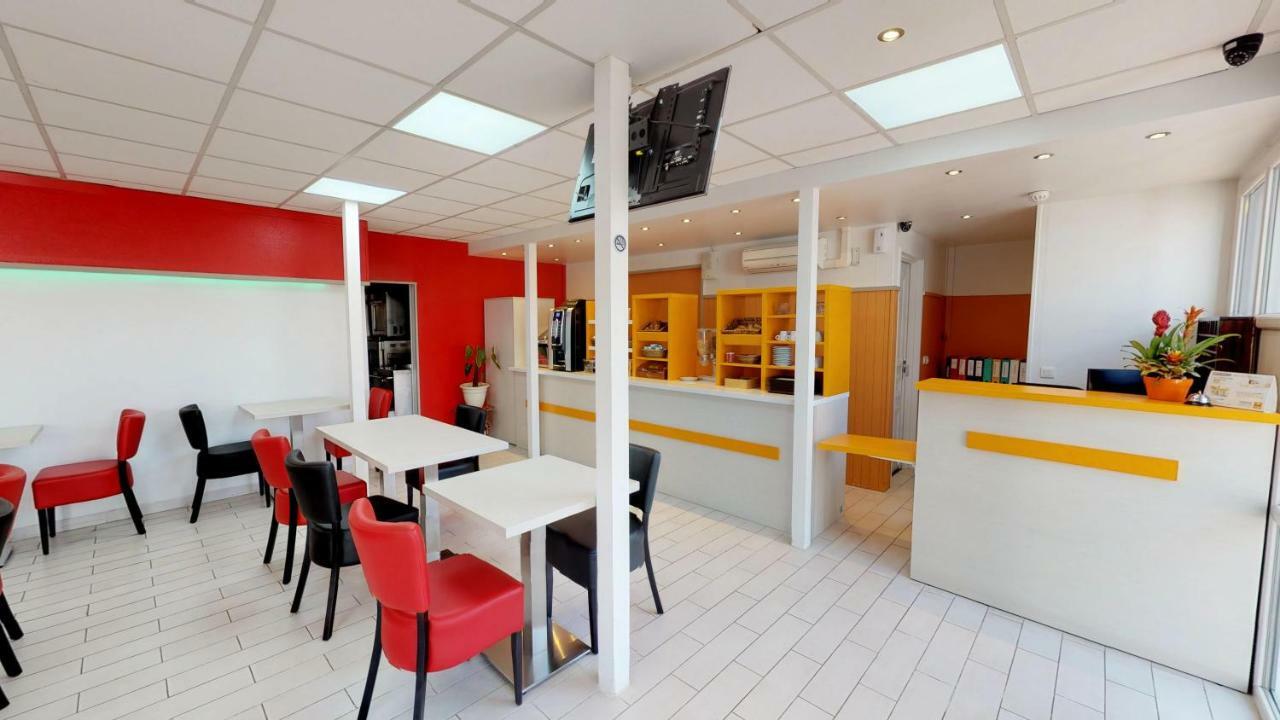 Kyriad Direct Acheres Exterior photo