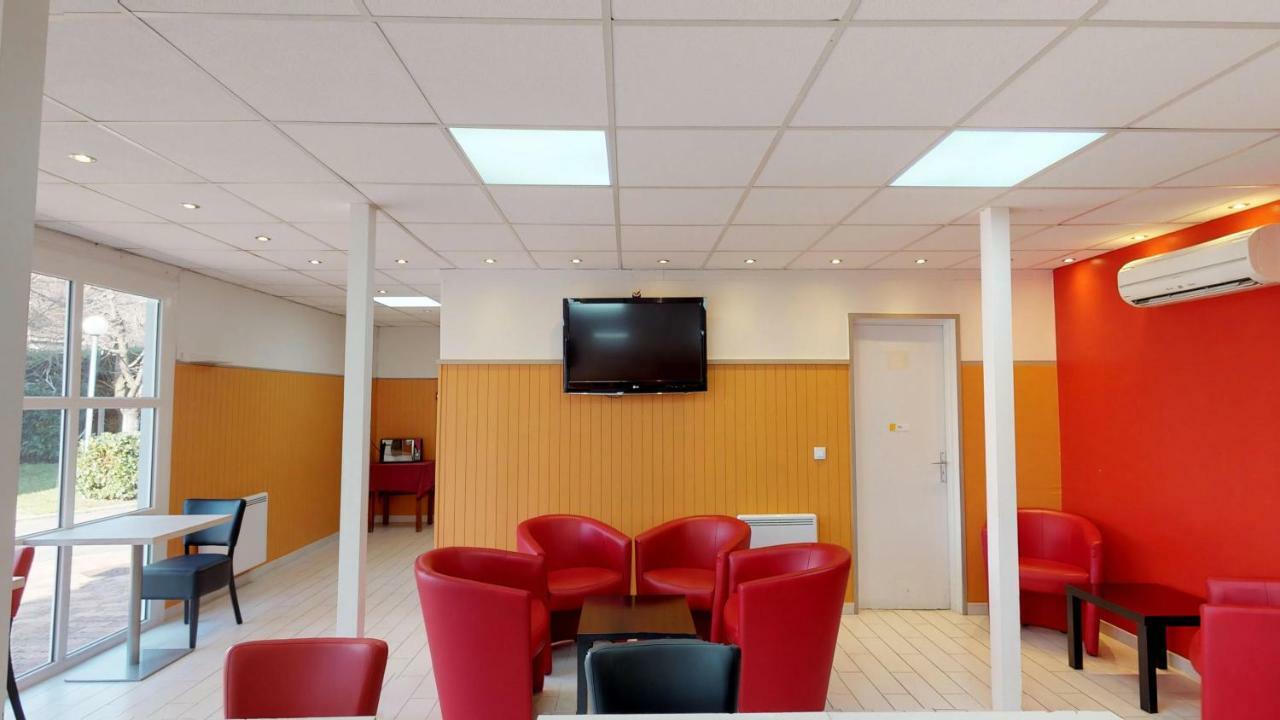 Kyriad Direct Acheres Exterior photo