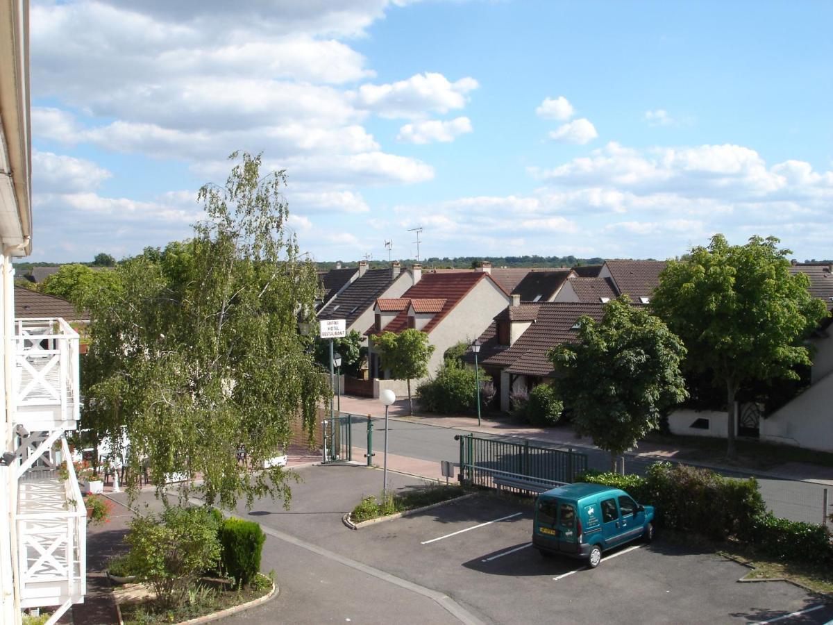 Kyriad Direct Acheres Exterior photo